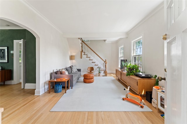 105 James St, Hastings-On-Hudson, NY 10706 - living area with crown molding, wood finished floors, stairs, arched walkways, and baseboards