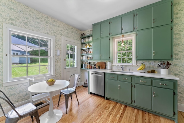 105 James St, Hastings-On-Hudson, NY 10706 - kitchen featuring wallpapered walls, stainless steel dishwasher, a sink, light wood-style flooring, and light countertops