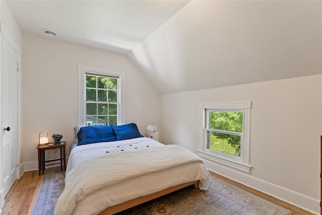 105 James St, Hastings-On-Hudson, NY 10706 - bedroom featuring vaulted ceiling, light wood finished floors, and baseboards