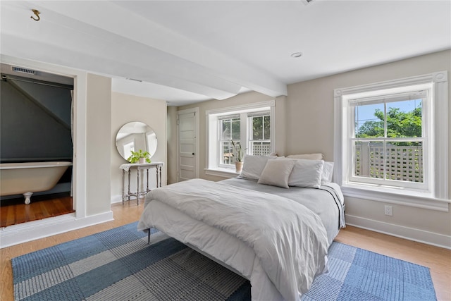 105 James St, Hastings-On-Hudson, NY 10706 - bedroom featuring baseboards, wood finished floors, and beam ceiling