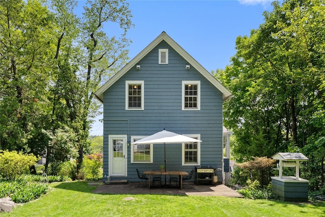 105 James St, Hastings-On-Hudson, NY 10706 - rear view of property with a patio and a lawn