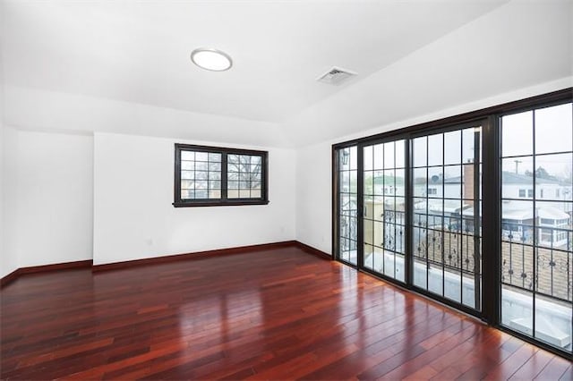 63-39 136th St, Flushing, NY 11367 - empty room featuring baseboards and wood finished floors