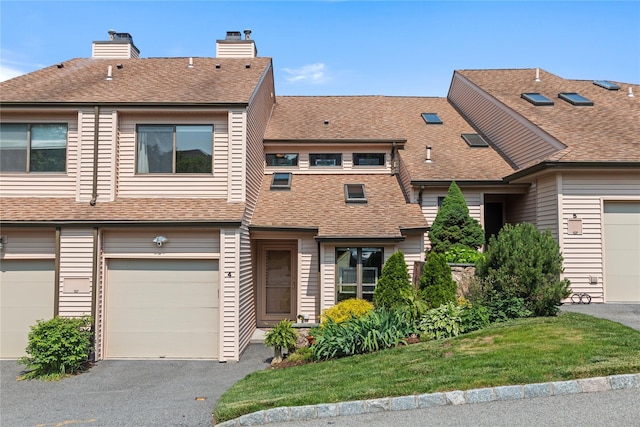 4 Hudson Watch Dr Unit 4, Ossining, NY 10562 - townhome / multi-family property with roof with shingles, a chimney, and driveway