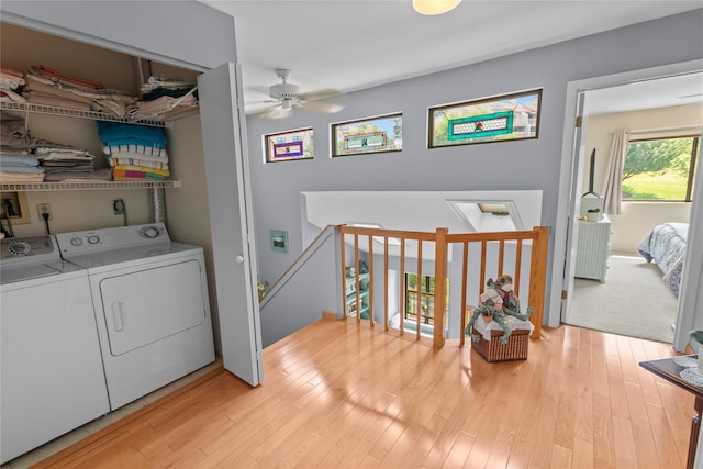 4 Hudson Watch Dr Unit 4, Ossining, NY 10562 - laundry area with ceiling fan, washer and dryer, and wood finished floors