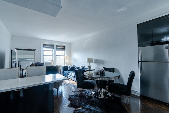 160-15 Powells Cove Blvd Unit E302, Whitestone, NY 11357 - dining area featuring dark wood finished floors, ornamental molding, and baseboards