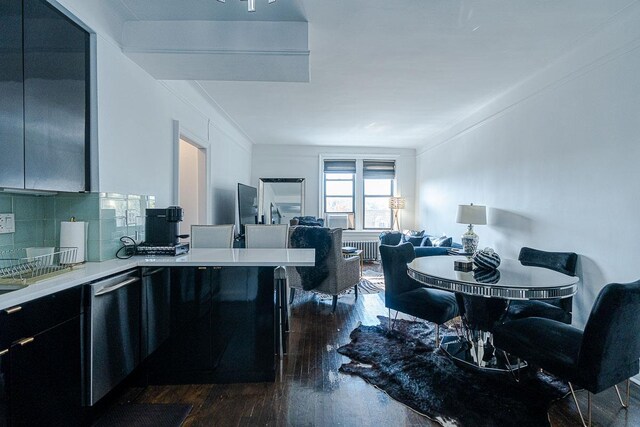 160-15 Powells Cove Blvd Unit E302, Whitestone, NY 11357 - kitchen featuring modern cabinets, dark cabinets, light countertops, dark wood finished floors, and open floor plan