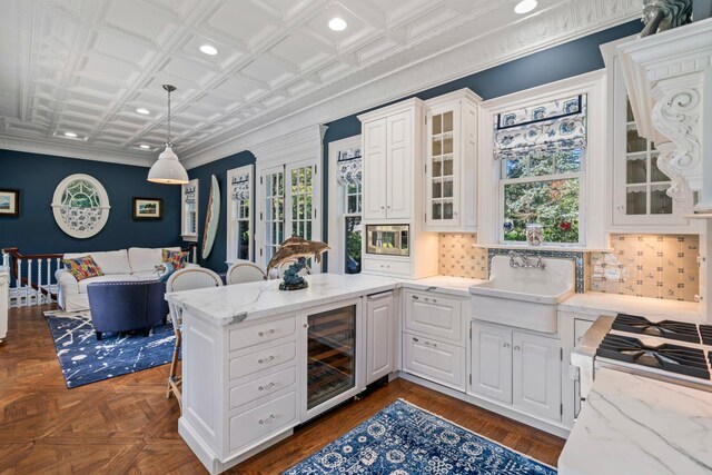 7 Fox Meadow Ln, Lloyd Harbor, NY 11743 - kitchen with beverage cooler, white cabinets, tasteful backsplash, glass insert cabinets, and recessed lighting
