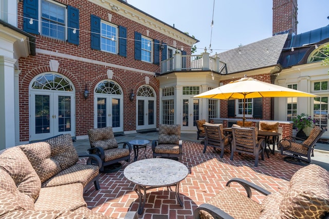 7 Fox Meadow Ln, Lloyd Harbor, NY 11743 - patio / terrace with french doors, an outdoor hangout area, and a patio