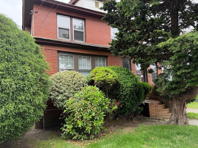 401 Oakland Ave, Cedarhurst, NY 11516 - view of side of home featuring brick siding