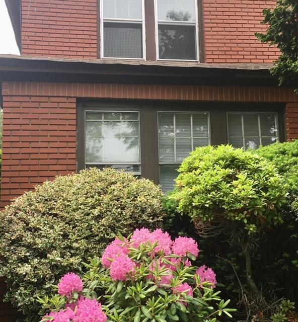 401 Oakland Ave, Cedarhurst, NY 11516 - property entrance with brick siding