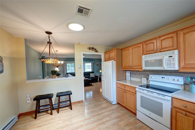 68A Enfield Ct Unit 68A, Ridge, NY 11961 - kitchen with white appliances, a baseboard heating unit, light wood-style floors, tasteful backsplash, and light countertops