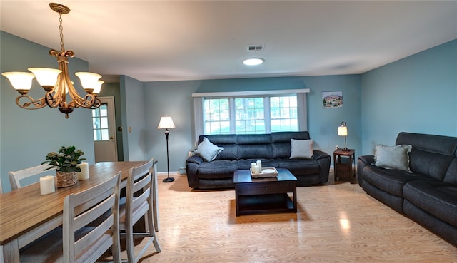 68A Enfield Ct Unit 68A, Ridge, NY 11961 - living area with a chandelier, light wood-style flooring, baseboards, and recessed lighting