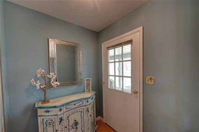 68A Enfield Ct Unit 68A, Ridge, NY 11961 - doorway to outside with baseboards