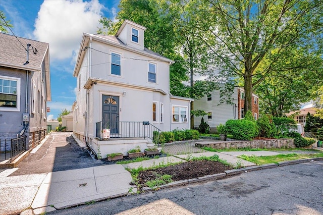 146 First St, Yonkers, NY 10704 - american foursquare style home featuring stucco siding