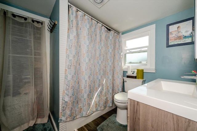 146 First St, Yonkers, NY 10704 - full bath featuring toilet, vanity, and wood finished floors