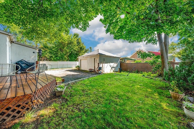 146 First St, Yonkers, NY 10704 - view of yard featuring an outdoor structure, a garage, and a wooden deck