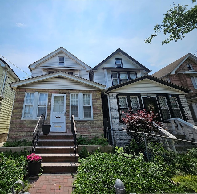 173-12 93rd Ave, Jamaica, NY 11433 - view of front facade featuring stone siding and entry steps
