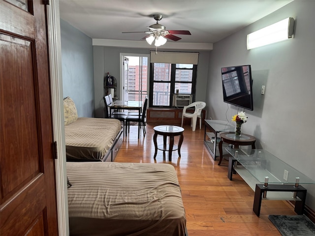 61-55 98th St Unit 14L, Rego Park, NY 11374 - bedroom with light wood-type flooring
