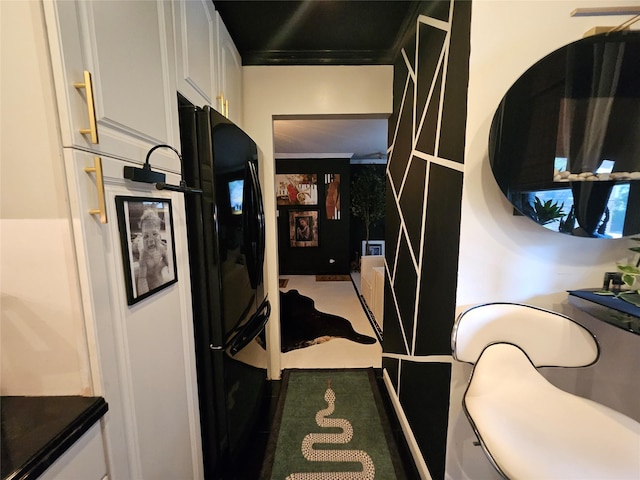 112-25 34th Ave Unit 2D, Corona, NY 11368 - kitchen featuring white cabinets and freestanding refrigerator