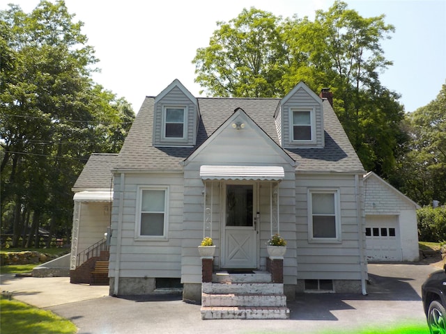 92 Lincoln Blvd, Hauppauge, NY 11788 - cape cod home with a shingled roof and a garage