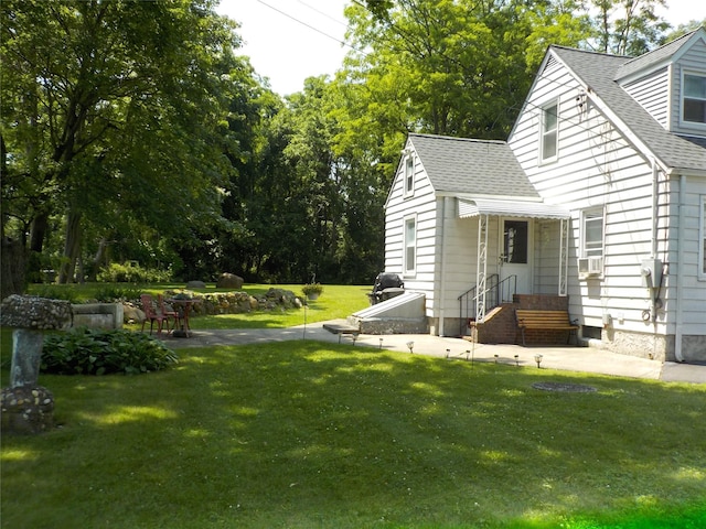 92 Lincoln Blvd, Hauppauge, NY 11788 - view of green lawn featuring cooling unit
