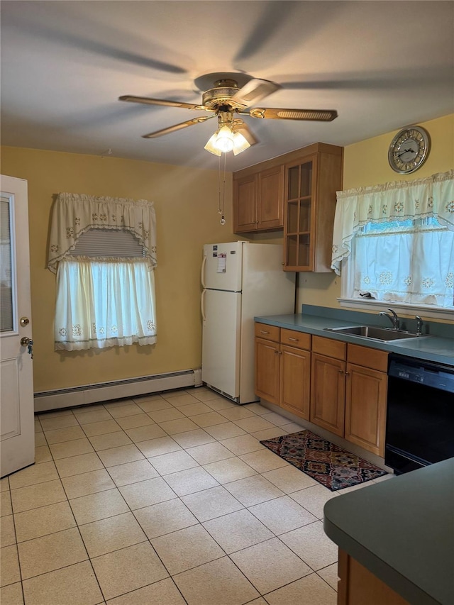 92 Lincoln Blvd, Hauppauge, NY 11788 - kitchen featuring black dishwasher, a baseboard heating unit, freestanding refrigerator, brown cabinets, and a ceiling fan