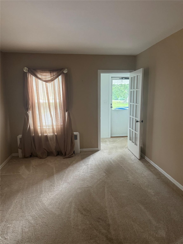 92 Lincoln Blvd, Hauppauge, NY 11788 - empty room featuring carpet and french doors
