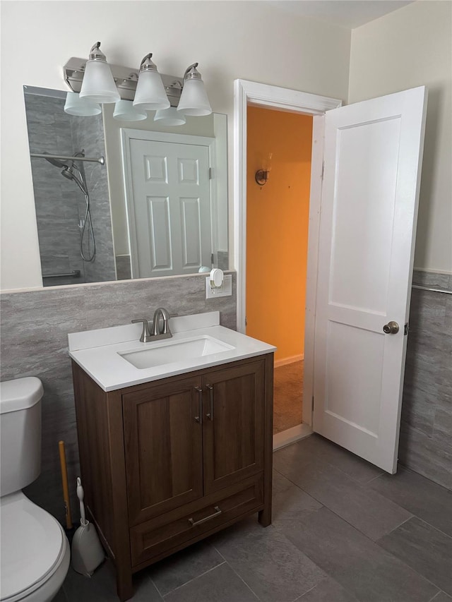 92 Lincoln Blvd, Hauppauge, NY 11788 - bathroom featuring vanity, tile walls, a shower, and tile patterned flooring