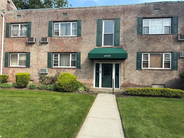 1079 Hunter Ave # 1, Valley Stream, NY 11580 - view of property with cooling unit and a wall unit AC