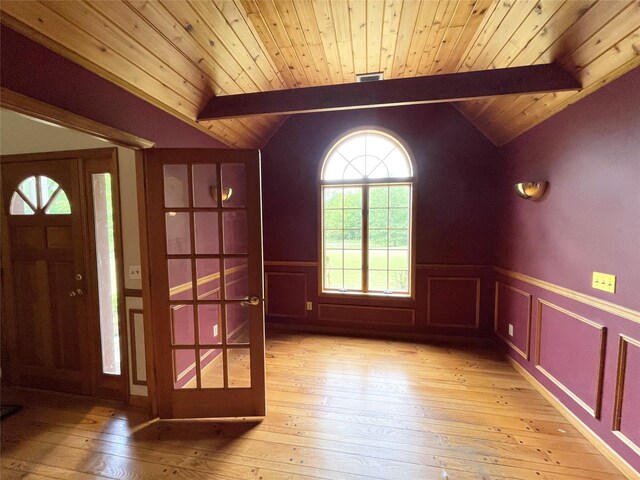 71 Saddleback Ridge Rd, Wallkill, NY 12589 - entrance foyer with light wood-type flooring, wooden ceiling, and wainscoting