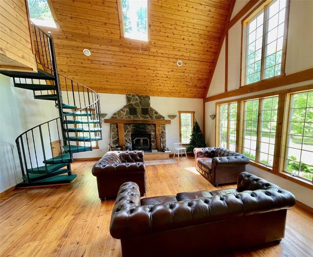 71 Saddleback Ridge Rd, Wallkill, NY 12589 - living room with high vaulted ceiling, stairs, healthy amount of natural light, light wood-style floors, and a skylight