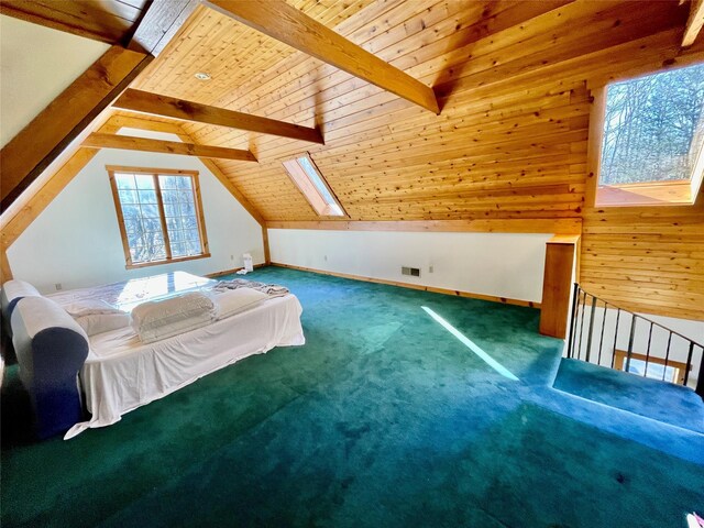 71 Saddleback Ridge Rd, Wallkill, NY 12589 - bedroom with carpet floors, a skylight, and wooden walls
