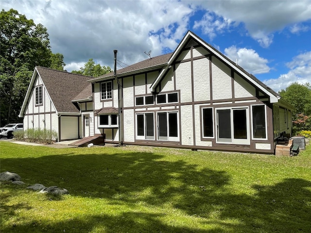 71 Saddleback Ridge Rd, Wallkill, NY 12589 - back of property with a lawn, stucco siding, and roof with shingles