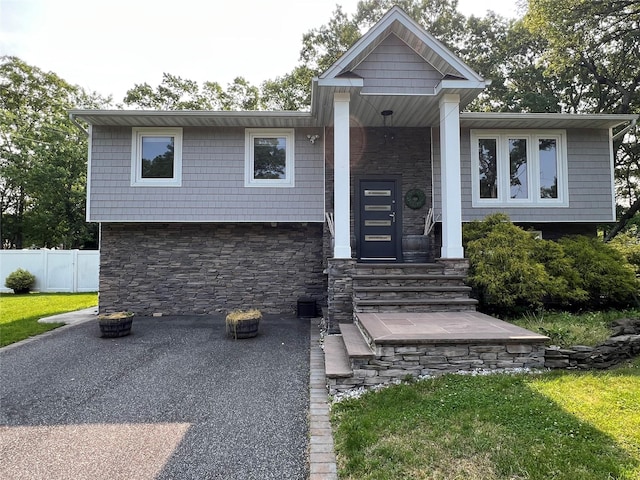 35 Junard Blvd, Port Jefferson Station, NY 11776 - view of front of home featuring stone siding