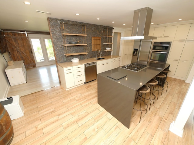 35 Junard Blvd, Port Jefferson Station, NY 11776 - kitchen with stainless steel appliances, modern cabinets, open shelves, a sink, and island range hood