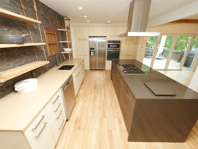 35 Junard Blvd, Port Jefferson Station, NY 11776 - kitchen with stainless steel appliances, a sink, modern cabinets, light wood-style floors, and island exhaust hood
