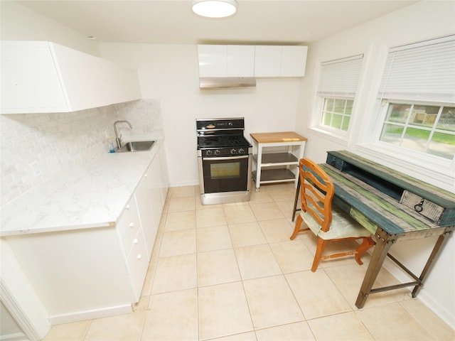 35 Junard Blvd, Port Jefferson Station, NY 11776 - kitchen with gas range, a sink, white cabinets, tasteful backsplash, and under cabinet range hood