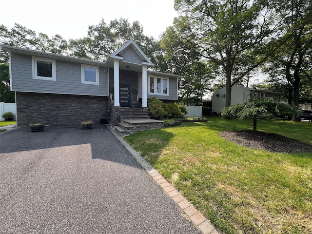 35 Junard Blvd, Port Jefferson Station, NY 11776 - split foyer home featuring stone siding and a front lawn