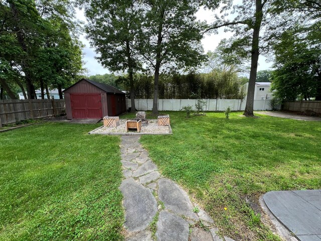 35 Junard Blvd, Port Jefferson Station, NY 11776 - view of yard featuring a garage