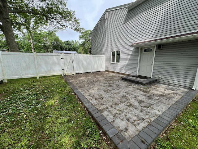 35 Junard Blvd, Port Jefferson Station, NY 11776 - view of patio featuring a gate