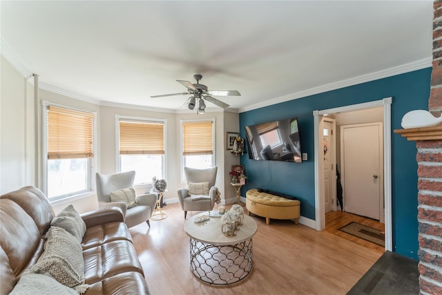 45 4th St, Valley Stream, NY 11581 - living area with light wood-style flooring, ceiling fan, and crown molding
