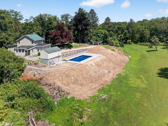 104 S Quaker Ln, Hyde Park, NY 12538 - view of pool with a lawn and a wooded view