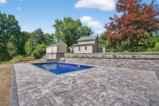 104 S Quaker Ln, Hyde Park, NY 12538 - outdoor pool with a patio area and an outdoor structure