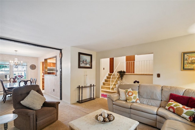 82 Cherry Ln, Lynbrook, NY 11563 - living area featuring a chandelier, stairway, and light colored carpet