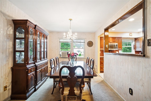 82 Cherry Ln, Lynbrook, NY 11563 - carpeted dining space featuring a chandelier, cooling unit, and recessed lighting