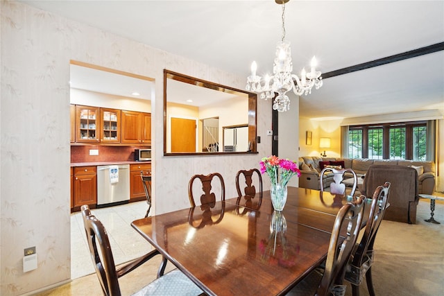 82 Cherry Ln, Lynbrook, NY 11563 - dining room featuring a chandelier