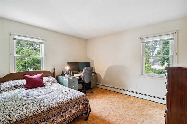 82 Cherry Ln, Lynbrook, NY 11563 - bedroom with a baseboard radiator, multiple windows, and carpet
