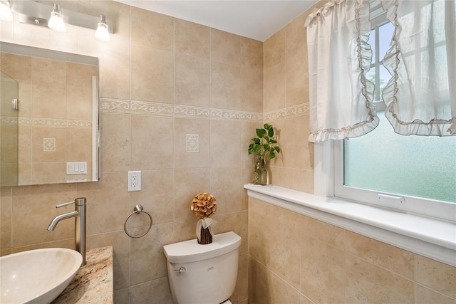 82 Cherry Ln, Lynbrook, NY 11563 - bathroom with a sink and tile walls
