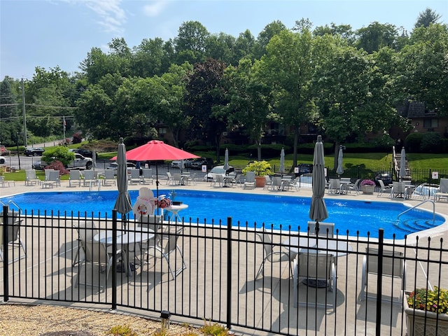 7-05 Briarcliff Dr S, Ossining, NY 10562 - community pool with a patio and view of wooded area