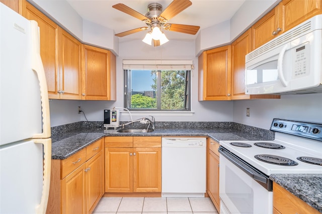 7-05 Briarcliff Dr S, Ossining, NY 10562 - kitchen featuring white appliances, ceiling fan, light tile patterned floors, and dark stone counters